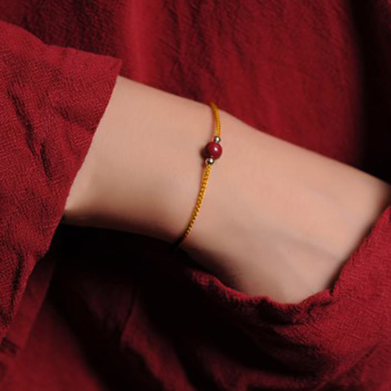 Pulsera trenzada con cadena de bendición de cinabrio natural chapada en oro de 14 quilates con Buddha Stones