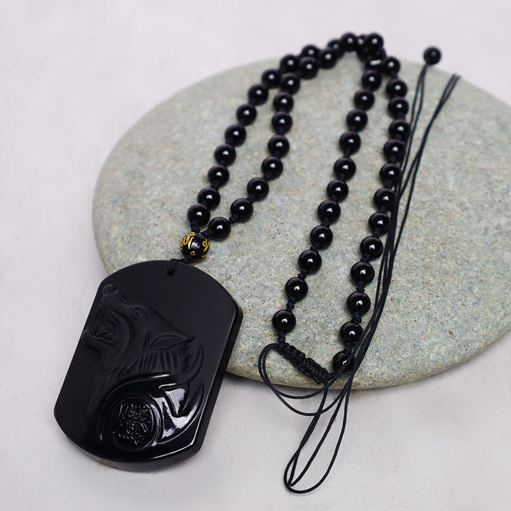 Collar con colgante de purificación de lobo de piedra de obsidiana negra con Buddha Stones