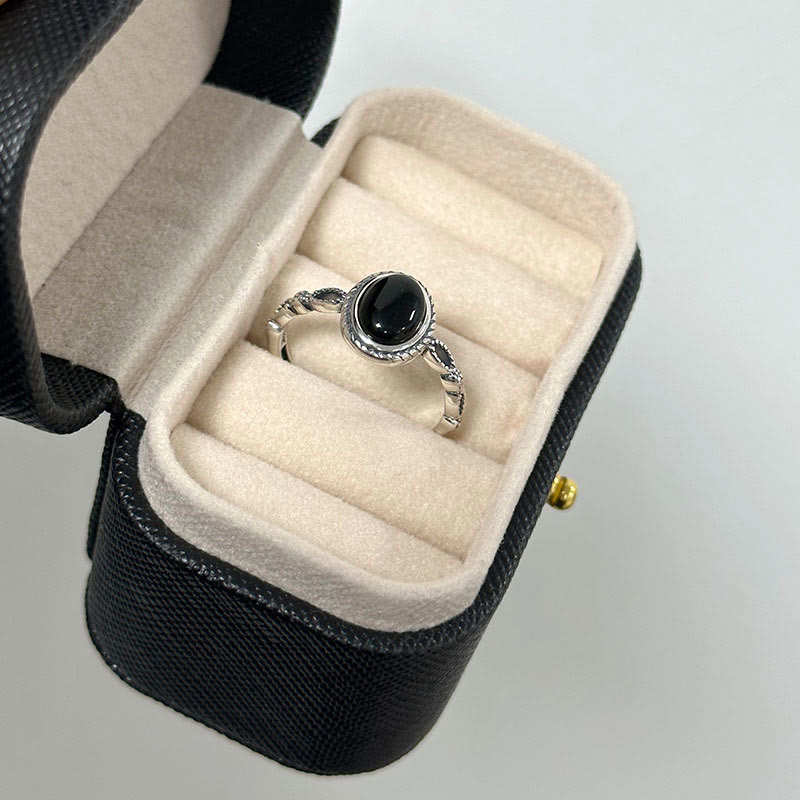 Anillo de la fortuna de ónix negro de plata de ley 925 con Buddha Stones