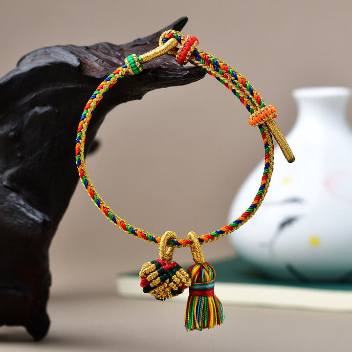 Pulsera con dije de bola dorada Zongzi hecha a mano con cuerda colorida y Buddha Stones