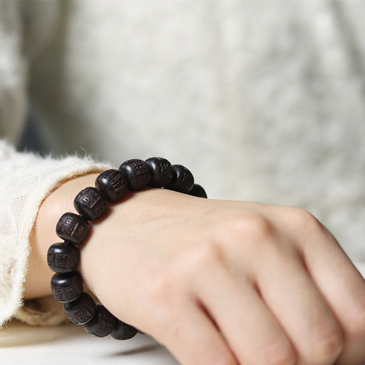 Pulsera de equilibrio grabada con Buddha Stones , madera de ébano del Tíbet, Om Mani Padme Hum