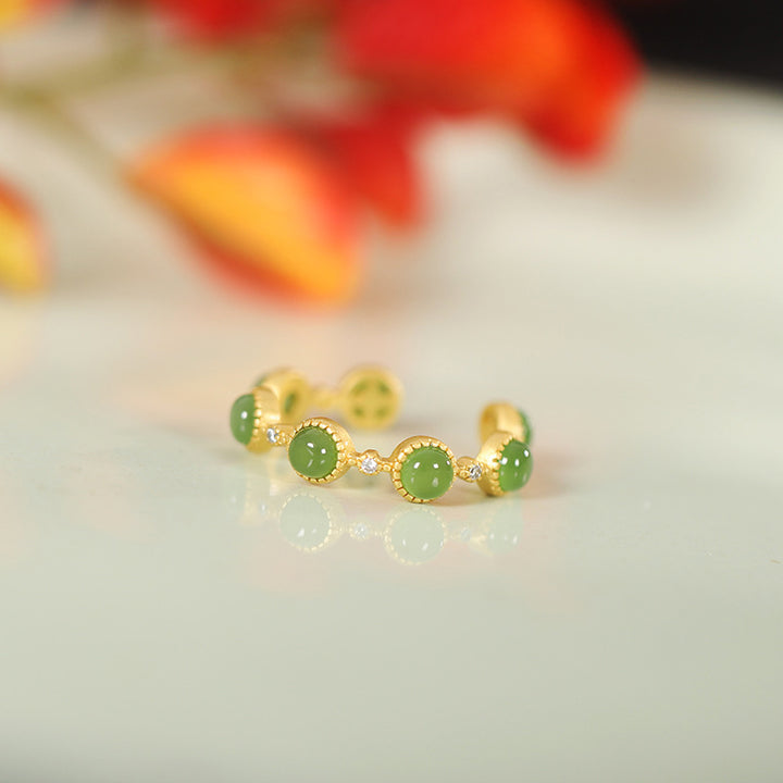 Anillo ajustable calmante curativo de jade cian con Buddha Stones