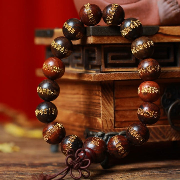 Pulsera de curación grabada con sutra de corazón de palisandro tibetano