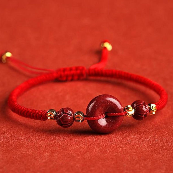 Pulsera trenzada de bendición con hebilla de paz y cinabrio de loto hecha a mano con Buddha Stones