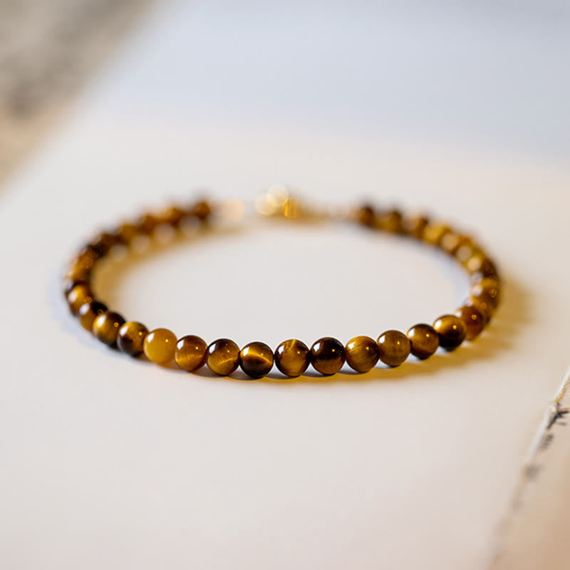 Buddha Stones Pulsera de protección de coraje con piedra de ojo de tigre natural chapada en oro de 14 quilates
