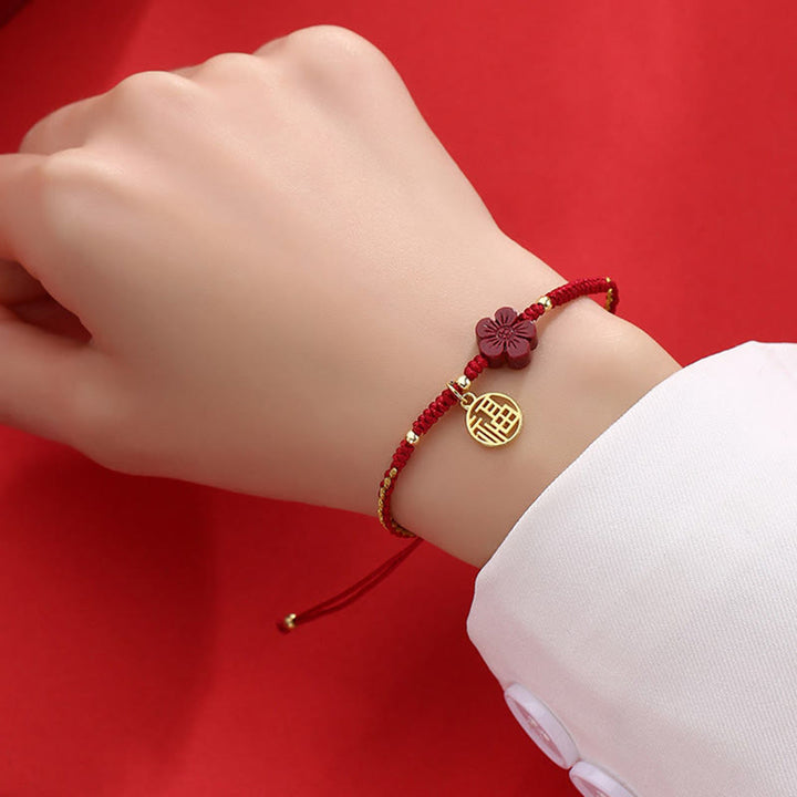 Pulsera de hilo trenzado con Buddha Stones, flor de cinabrio, carácter Fu, bendición