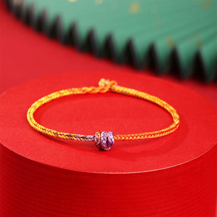 Pulsera de cuerda trenzada roja de oro púrpura colorida hecha a mano con Buddha Stones