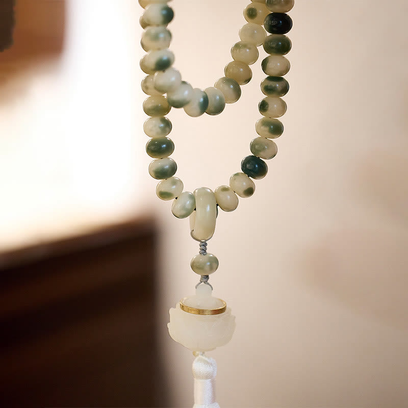 Buddha Stones Natural 108 cuentas Mala semilla Bodhi loto grabado sabiduría borla pulsera