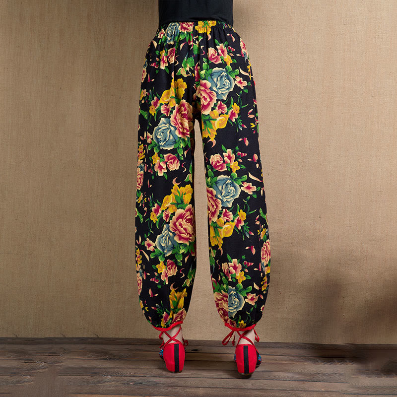 Pantalones bombachos con estampado de flores rojas y verdes de estilo étnico con Buddha Stones y bolsillos