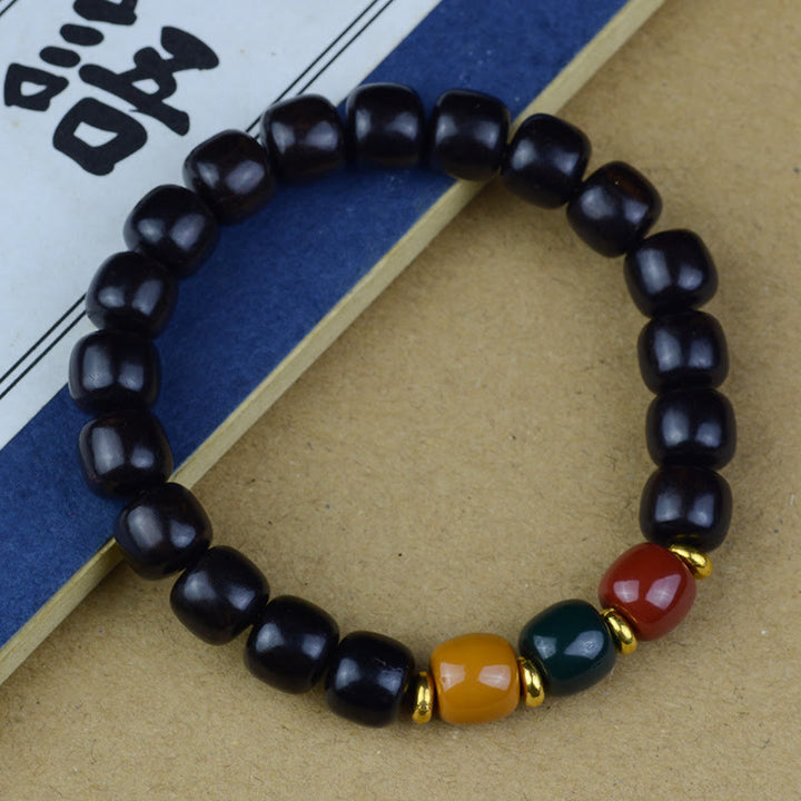 Pulsera de la paz de sándalo rojo de madera de ébano de sándalo verde multicolor con Buddha Stones