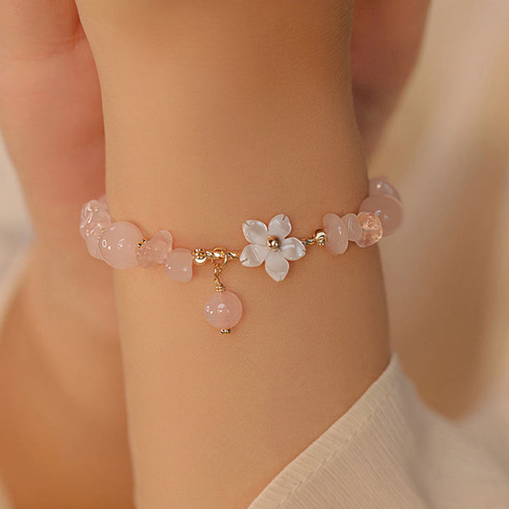 Pulsera de amor con flor de cristal rosa natural chapada en oro de 14 quilates con Buddha Stones