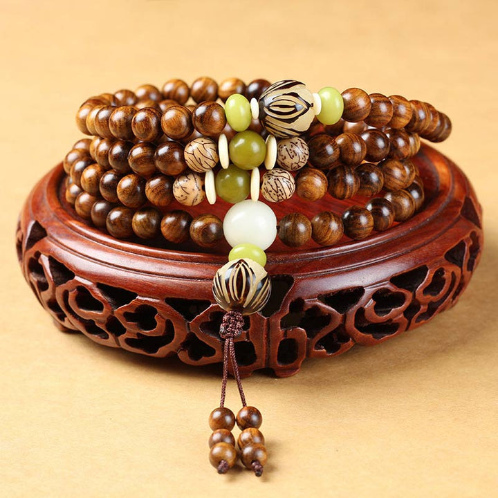 Pulsera Calma de Protección Mala de Palosanto Tibetano con Buddha Stones