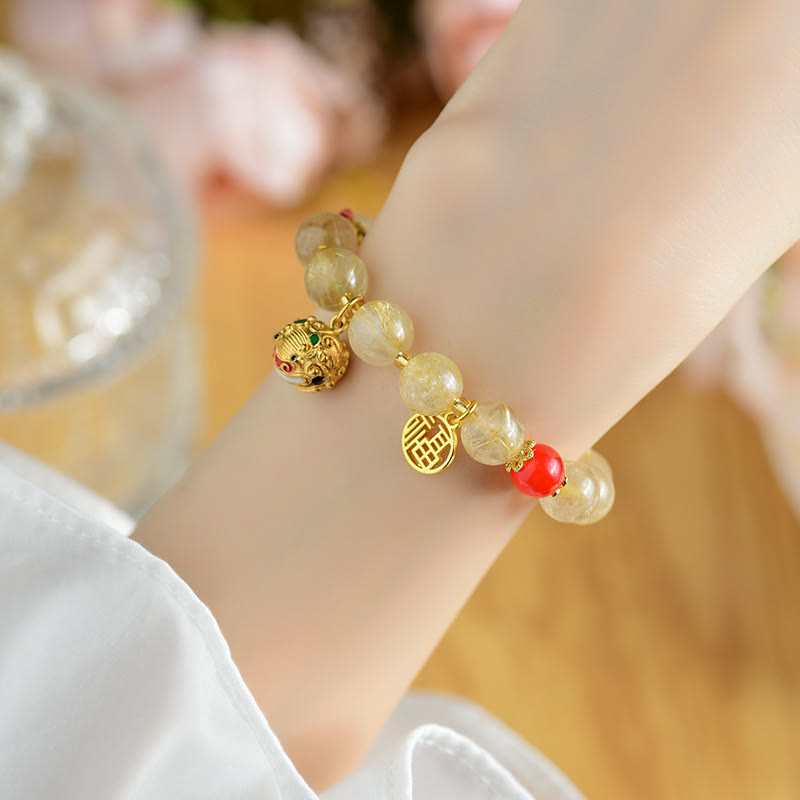 Pulsera de riqueza de campana con dije de personaje Fu de cuarzo rutilado dorado natural con Buddha Stones