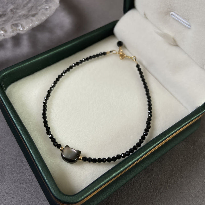 Pulsera curativa de piedra Tridacna de gato lindo de cristal blanco de espinela negra chapada en oro de 14 quilates con Buddha Stones - image 2