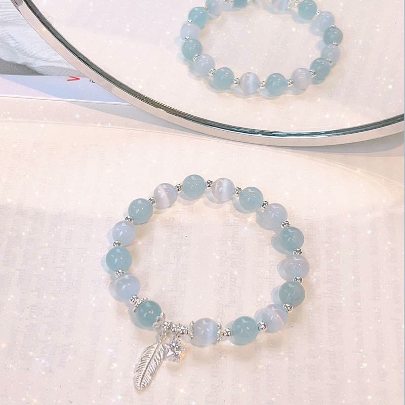 Pulsera con dije de estrella y plumas curativas de ojo de gato, aguamarina, plata de ley 925 con Buddha Stones