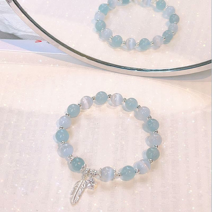 Pulsera con dije de estrella y plumas curativas de ojo de gato, aguamarina, plata de ley 925 con Buddha Stones