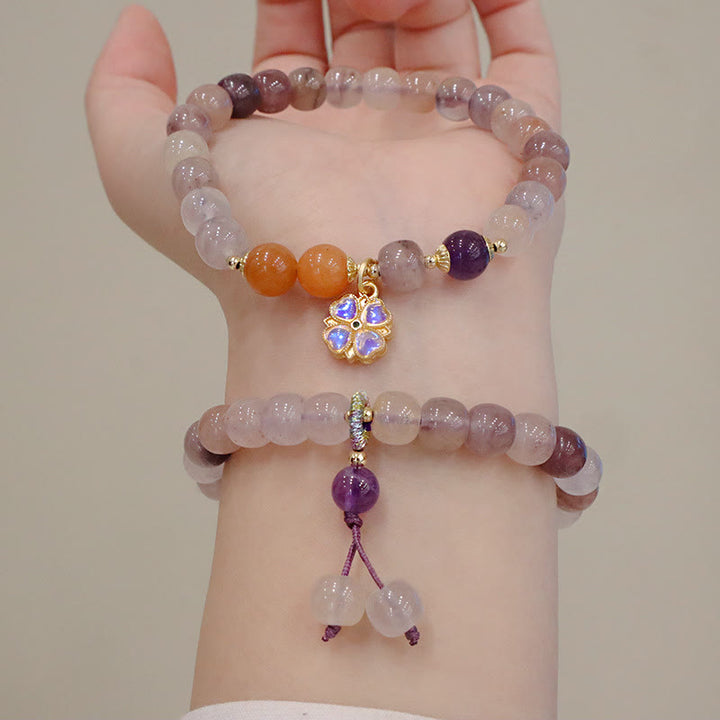 Pulsera de la riqueza del encanto del grano de la flor violeta del jade de la seda dorada púrpura natural de las Buddha Stones