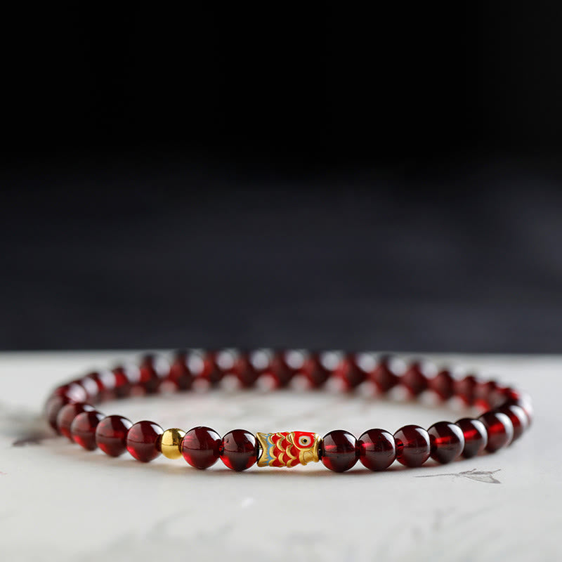 Pulsera de protección con granate natural y pez Koi de oro 999 de Buddha Stones - image 3