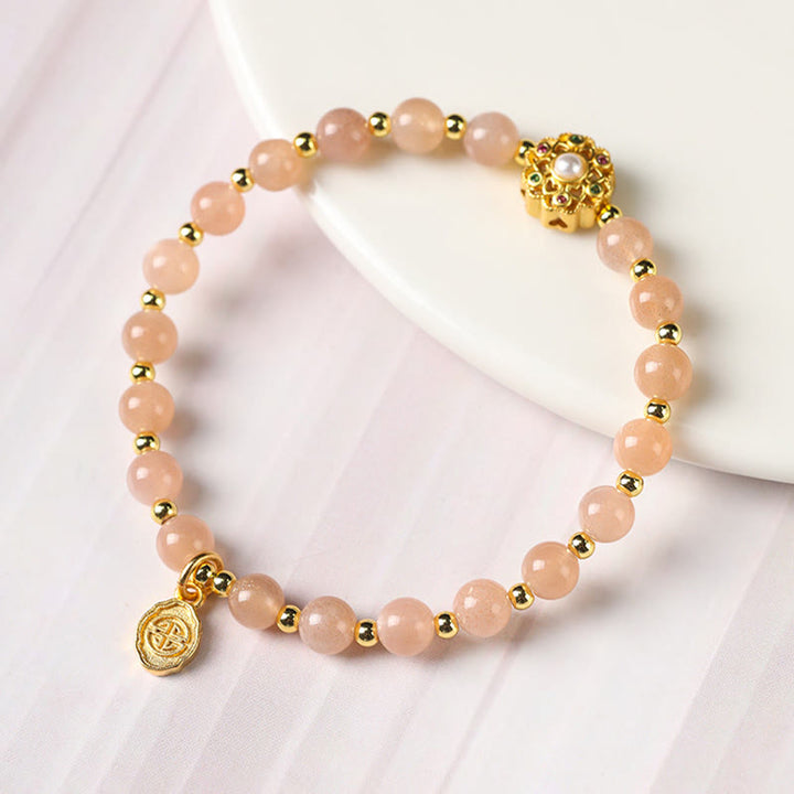 Buddha Stones chapadas en oro de 14 quilates, cuarzo fresa natural, labradorita, piedra solar, personaje Fu, pulsera con dije positivo
