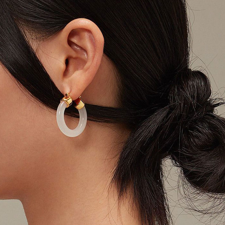 Pendientes de prosperidad de jade blanco redondo de Buddha Stones