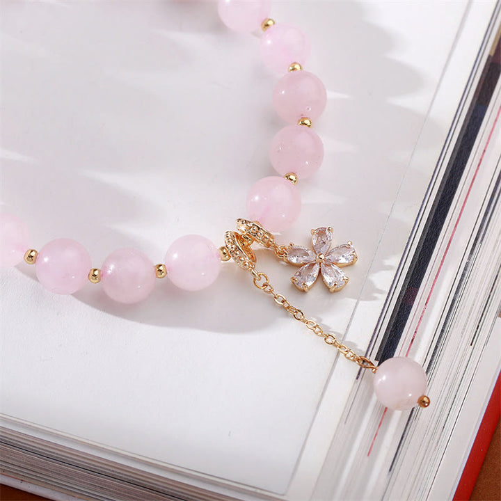 Pulsera de amor de flor de ciruelo de cristal rosa natural