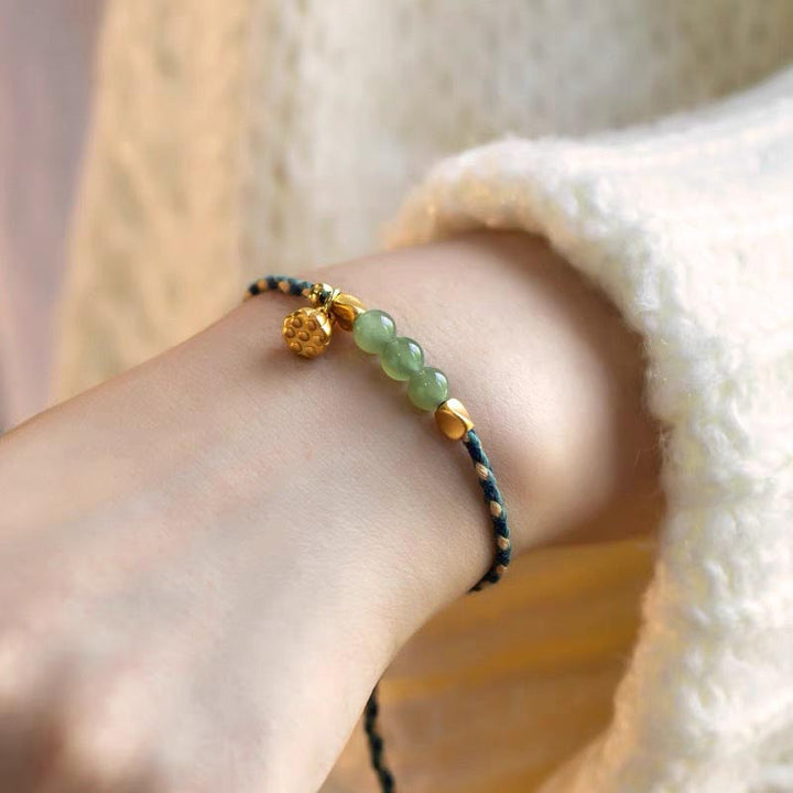Pulsera trenzada de la suerte con dije de loto de jade hetiano hecho a mano con Buddha Stones