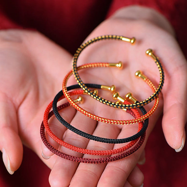 Pulsera de cuerda trenzada de la suerte hecha a mano con diseño simple de Buddha Stones