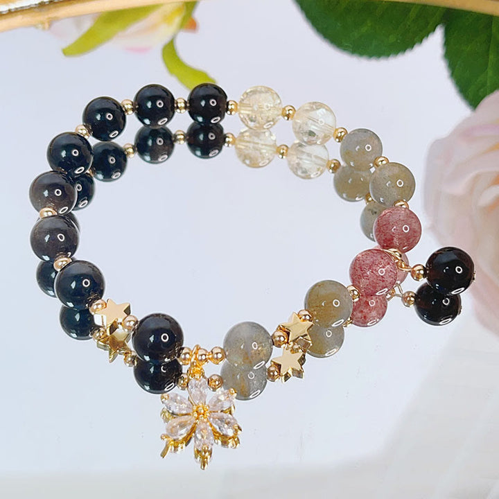 Pulsera de protección de flor de estrella de corazón de amor de obsidiana con brillo de plata natural de Buddha Stones