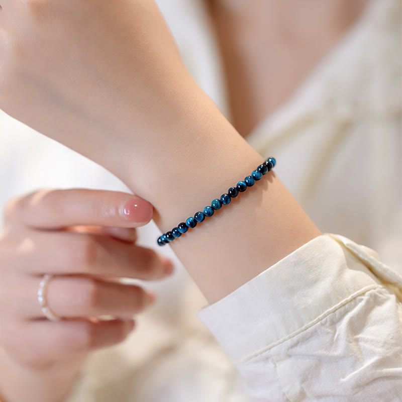 Pulsera de cadena de protección con piedra de ojo de tigre azul natural de Buddha Stones