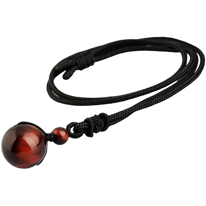 Collar de protección de ojos de tigre tibetano con Buddha Stones