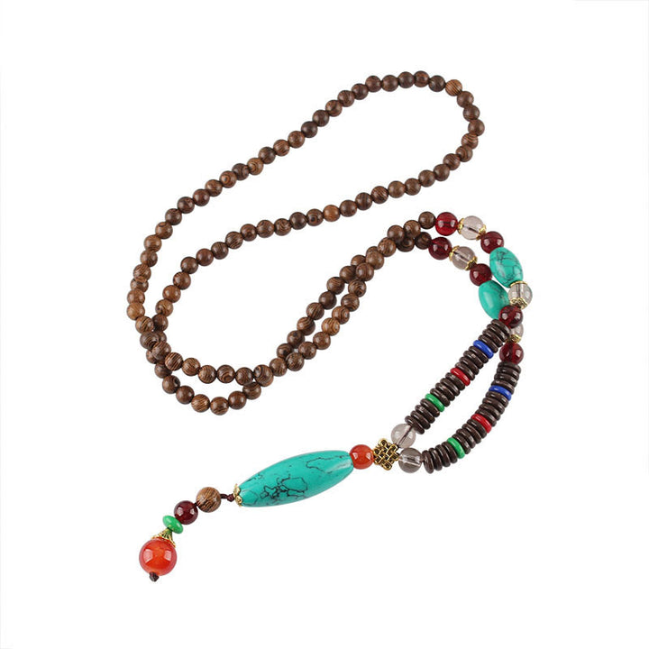 Buddha Stones Madera de wengué Piedra turquesa Protección Calma Collar Colgante