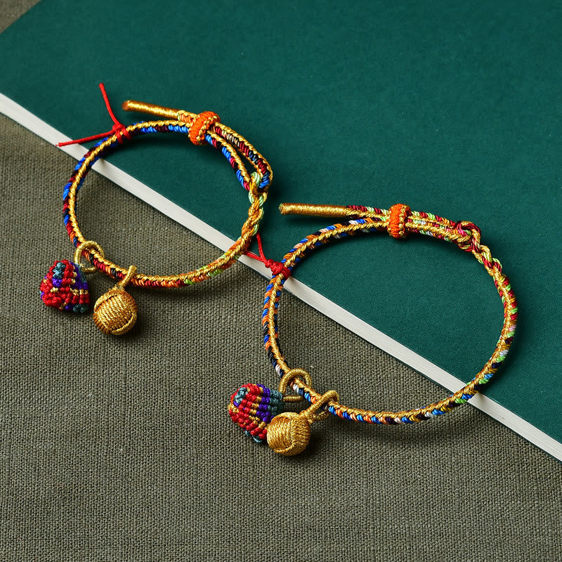 Pulsera con dije de bola dorada Zongzi hecha a mano con cuerda colorida y Buddha Stones