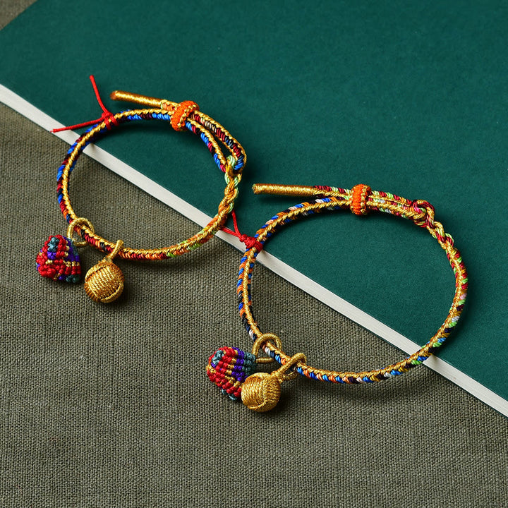 Pulsera con dije de bola dorada Zongzi hecha a mano con cuerda colorida y Buddha Stones