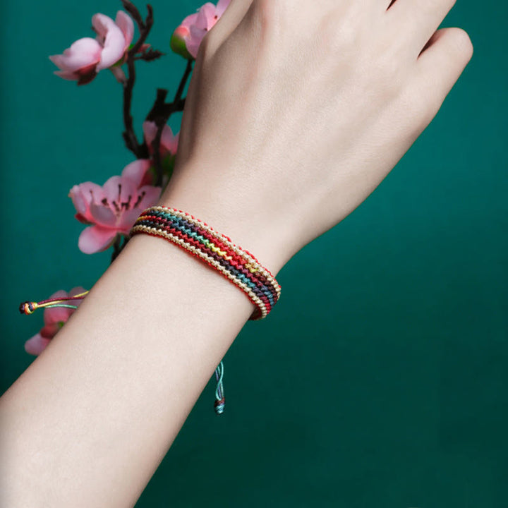 Pulsera de hilo trenzado con protección multicolor de arcoíris hecha a mano con Buddha Stones del Tíbet