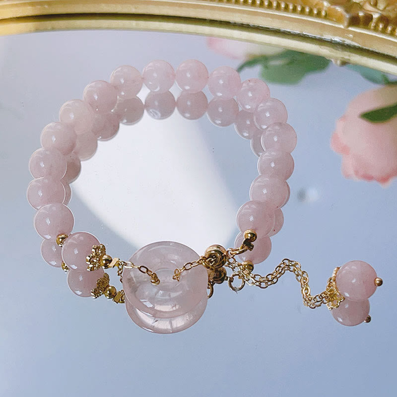 Pulsera con dije de amor con hebilla de paz y cristal rosa natural con Buddha Stones