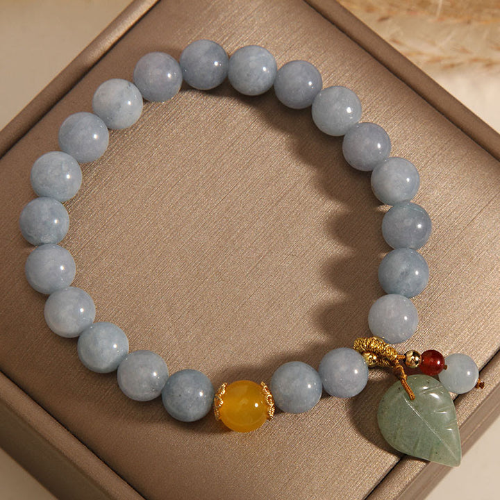 Pulsera con dijes curativos de hojas de jade, aguamarina y Buddha Stones