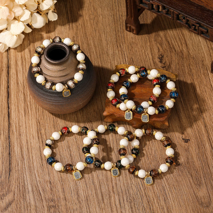 Buddha Stones tibetano Zakiram diosa de la riqueza encanto Liuli vidrio incienso ceniza porcelana pulsera de protección de cuentas