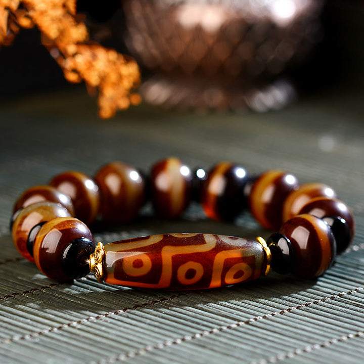 Pulsera de bendiciones de riqueza de ágata con cuentas Dzi de nueve ojos naturales tibetanas de Buddha Stones