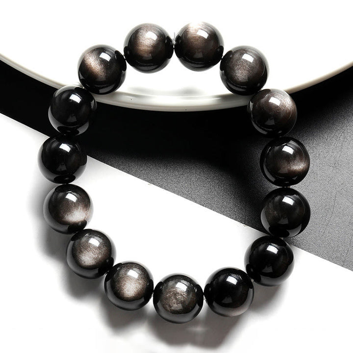 Pulsera de protección calmante de obsidiana brillante de plata natural con Buddha Stones