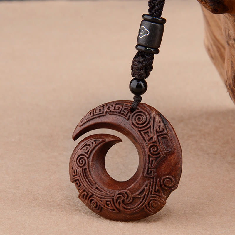 Buddha Stones, hoja pequeña, sándalo rojo, madera de ébano, la suerte mejora el diseño, colgante de collar de protección