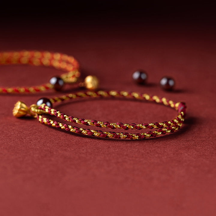 Pulsera trenzada con dije de paz y alegría de loto de cuerda de oro rojo hecha a mano con Buddha Stones