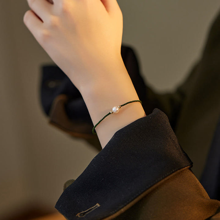 Pulsera de hilo trenzado de la suerte con cuentas de perlas naturales de piedras de Buddha Stones