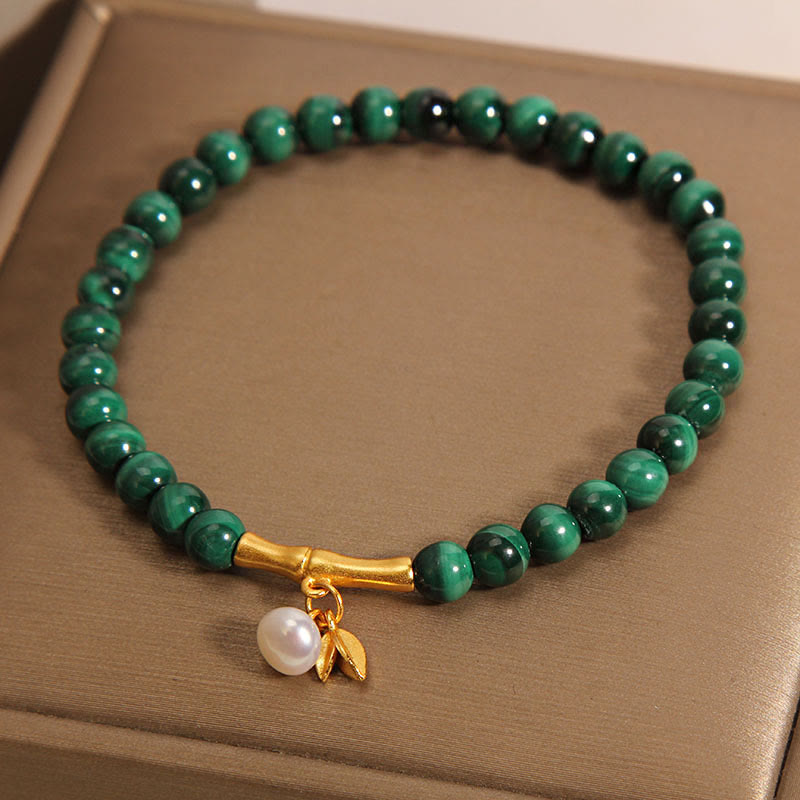 Pulsera antiansiedad de bambú de la suerte con perlas de malaquita natural de Buddha Stones