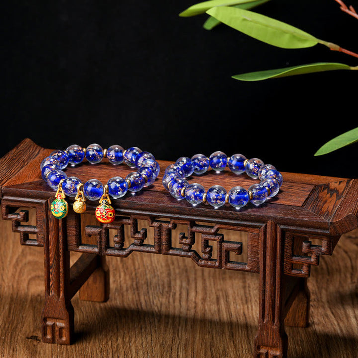 Pulsera de éxito con cuentas de cristal Liuli fluorescentes luminosas con abalorio familiar de bestia tragadora de oro con Buddha Stones
