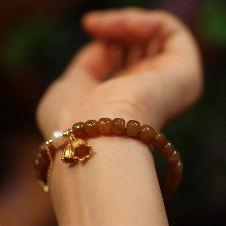 Pulsera con dije de lirio de los valles de jade hetiano natural de plata de ley 925