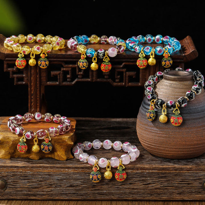 Pulsera de cuentas de cristal Liuli fluorescente luminosa con corazón de amor rosa de la familia de las bestias que tragan oro con Buddha Stones