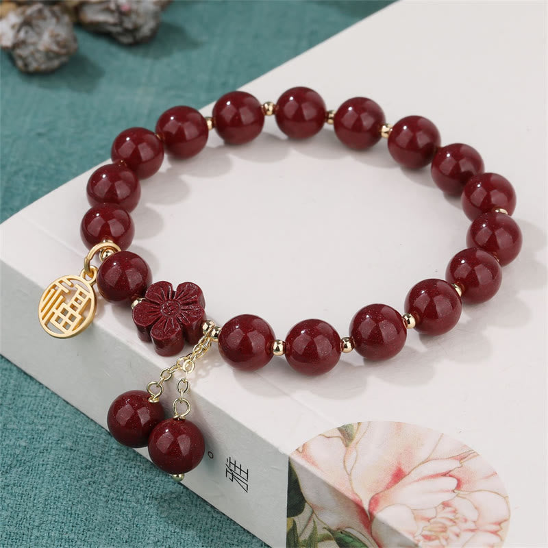 Pulsera de bendición de flor de cerezo con personaje de cinabrio de Buddha Stones