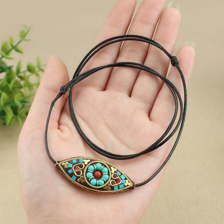 Collar con colgante de fuerza de protección con patrón de marquesa, cuentas de turquesa del Tíbet, Buddha Stones