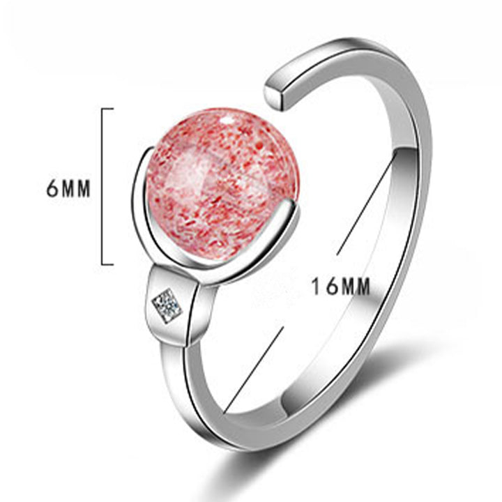 Anillo de rotación calmante de cristal rosa con Buddha Stones