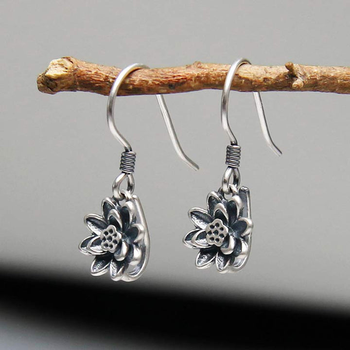 Pendientes de iluminación de flor de loto de plata de ley 925 con Buddha Stones